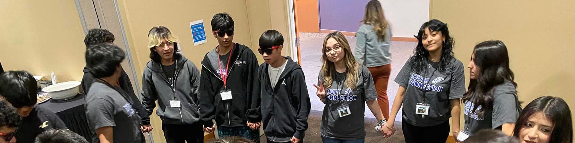 Group of Teens Holding Hands